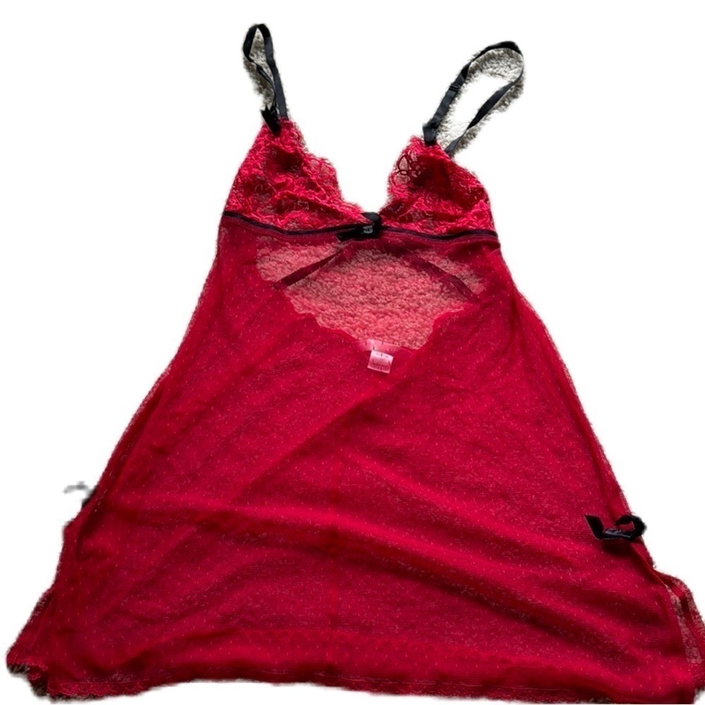 Victoria’s Secret L red sheer lingerie with black ribbon detail.